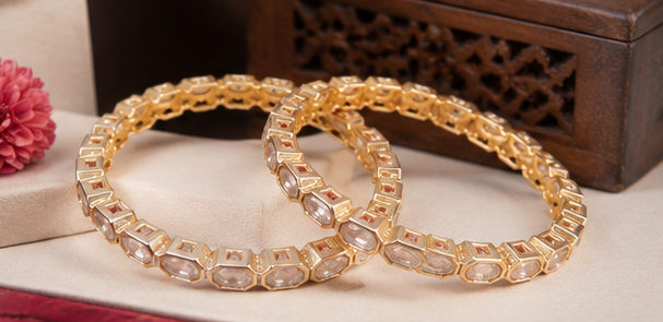 Premium gold finish uncut Kundan bangles for women by Glorious Jewels perfect for bridal wedding festive and party wear.