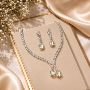 multi-strand pavé cubic zirconia lariat choker necklace featuring two cascading gold-framed American diamond-cut clear solitaire crystal pendants from Glorious Jewels.