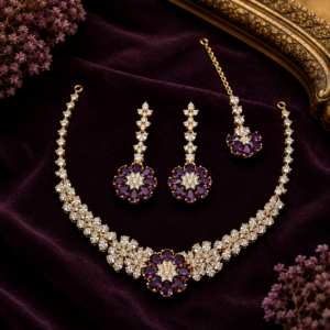 Necklace featuring a continuous band of sparkling clear leaf-cut CZ stones centering on a vibrant purple amethyst-toned floral flower motif from Glorious Jewels.