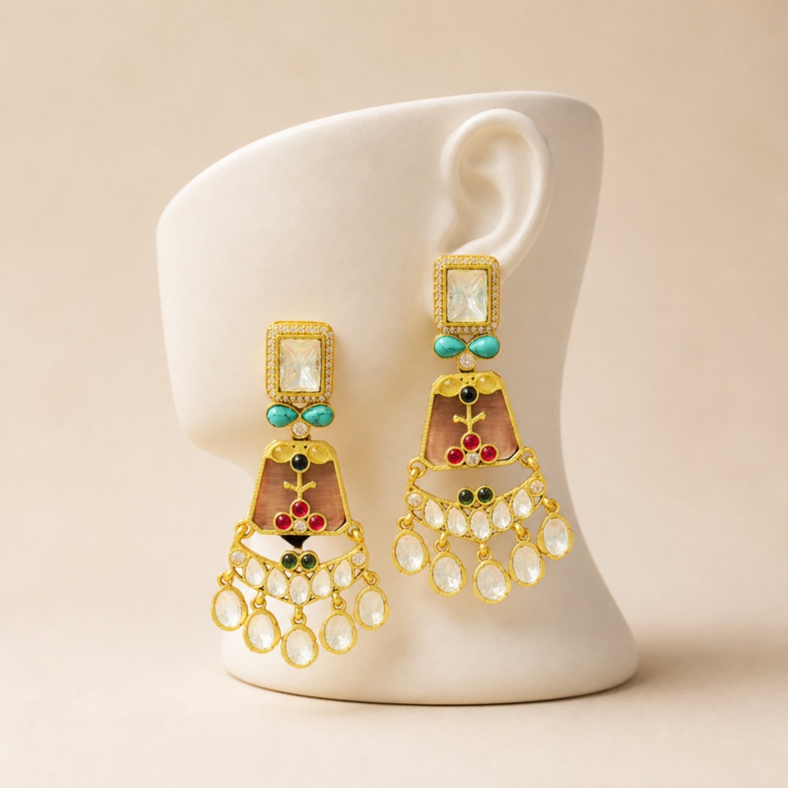 Uncut polki earrings displayed on a cream ceramic ear bust